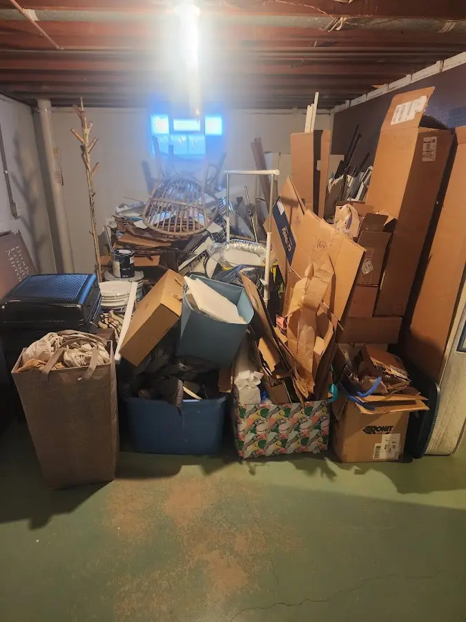 Roll-off dumpster container at job site for 20 Yard Dumpster Rental in Hopkins